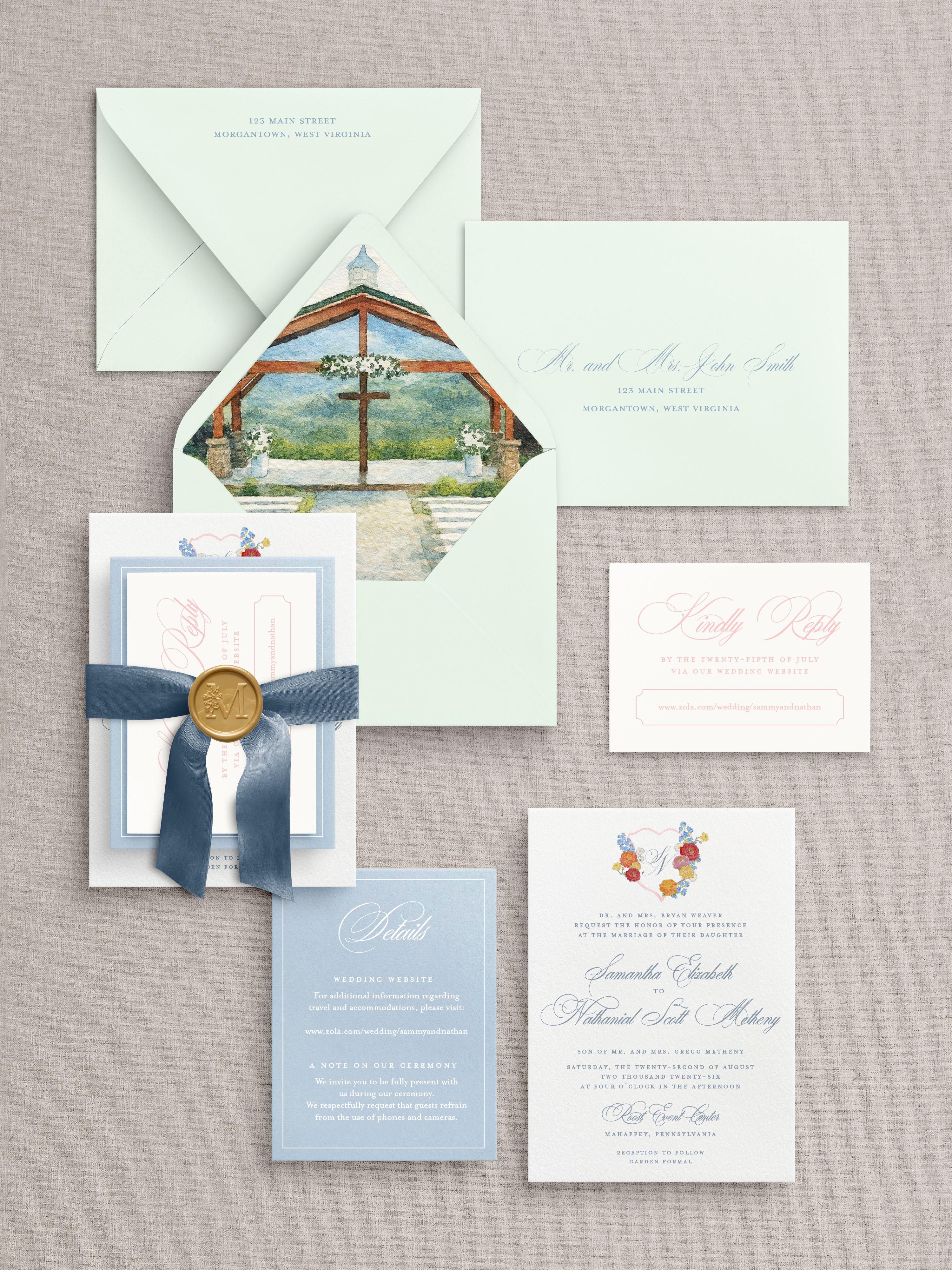 Spring wedding invitation suite with watercolor venue envelope liner, blue silk ribbon, and wax seal.