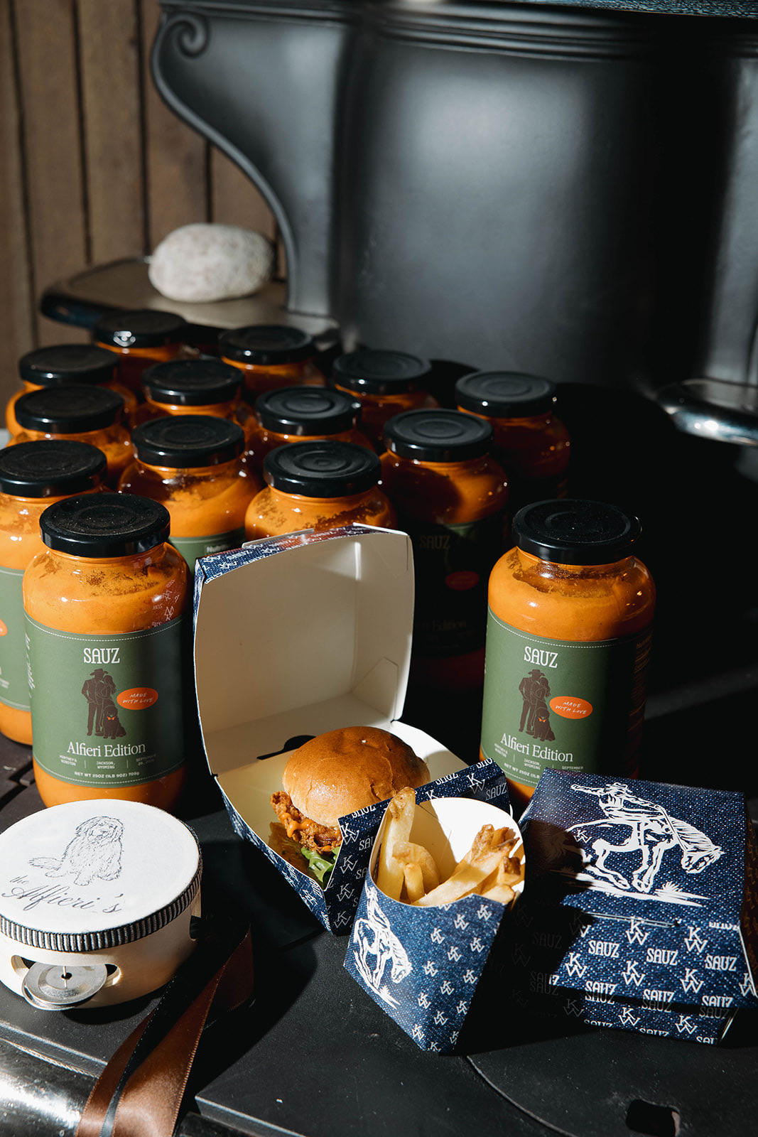 A close view of the late-night snack boxes and custom sauce labels.