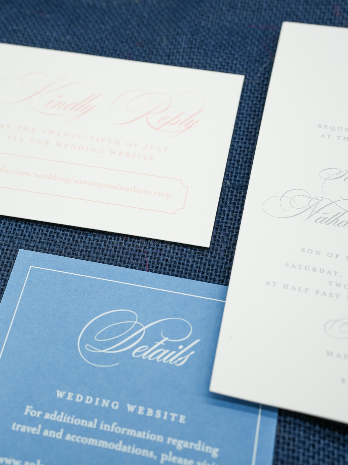 The blush reply card beside the French blue details card.