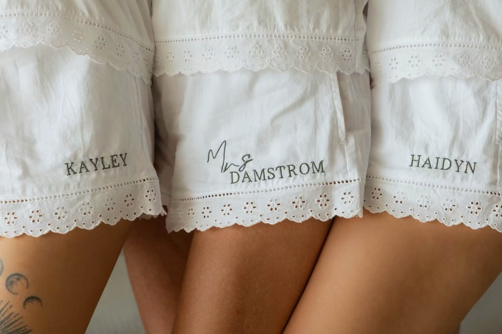 Embroidered bridal party shorts lettered with each name.